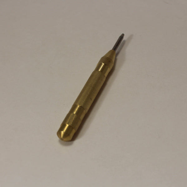 Spring loaded brass center punch