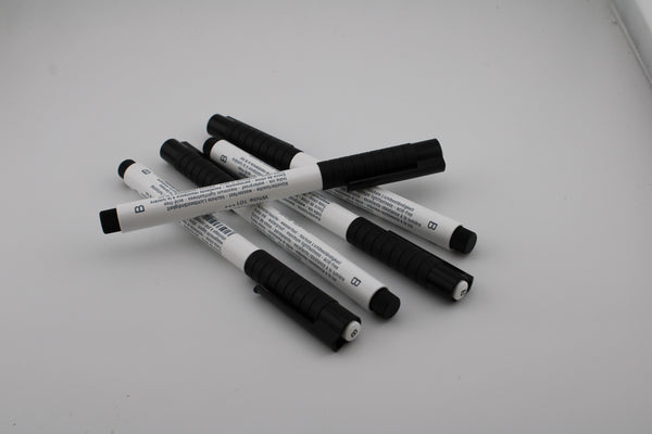 White fine brush tip india ink pen