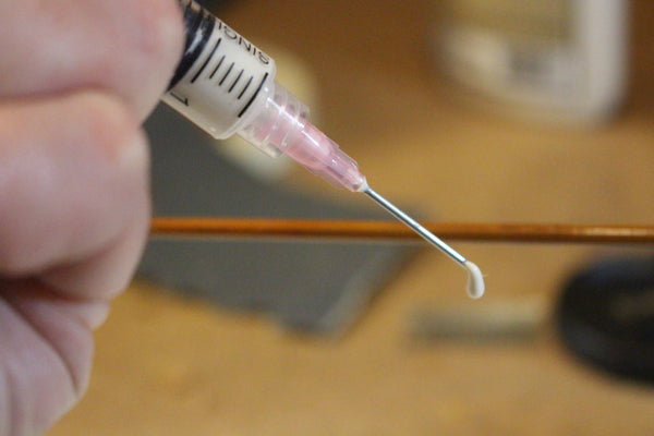 Repair syringe (needle tip)