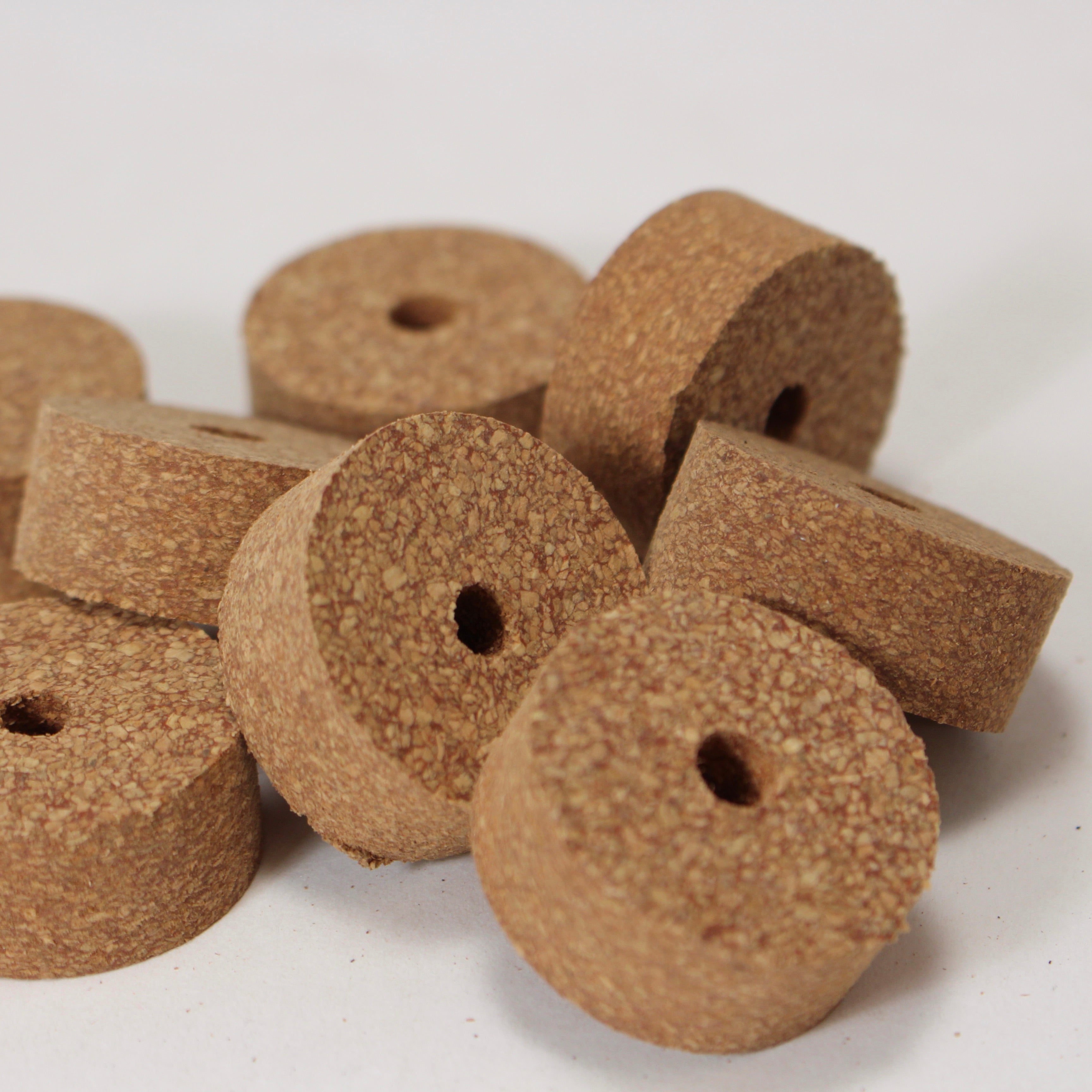 Red fine grain rubber cork ring 1 1/4 x 1/2 with 1/4 bore
